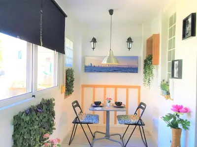 a table and two chairs in a room at Best refuge in Barcelona in Sant Adria de Besos