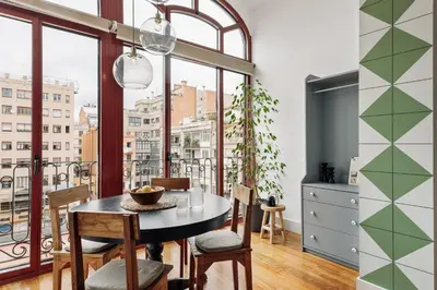 a living room with a couch and a table at Zamora - 3 bedrooms in Eixample Esquerra in Barcelona