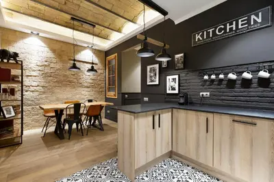 a kitchen with a table and a dining room at Sagrada266 by chicStays in Barcelona