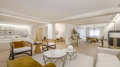 a living room with a couch and a table at Precioso Apartamento en Barcelona in Terrassa