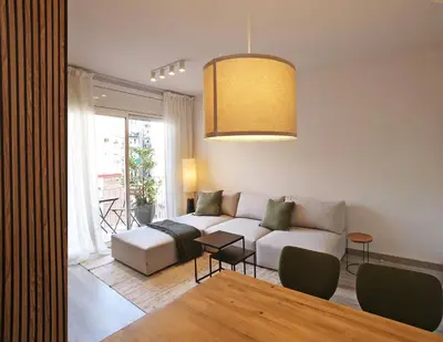 a living room with a couch and a table at Sagrada Familia - The Haus Bcn in Barcelona