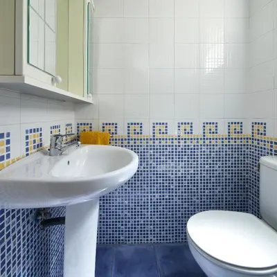 a bathroom with a sink and a toilet at Gran Via - 1 in Barcelona