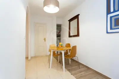a dining room with a table and chairs at Loft en Gracia II in Barcelona