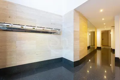 a bedroom with two beds with white pillows at Cosy Apartment next to Sagrada Familia V in Barcelona