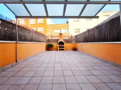 an empty courtyard of a building with a glass roof at Casa en alquiler vacacional Vilanova i la Geltrú in Vilanova i la Geltrú