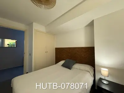 a bedroom with a bed and a ceiling at Palau de la música 11 in Barcelona