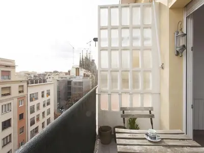 a view of a city from a balcony at Top Flat Sagrada in Barcelona