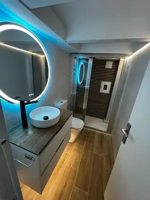 a bathroom with a sink and a mirror at Loft en Gracia in Barcelona
