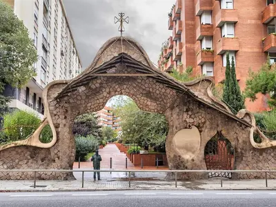 a man standing in front of a stone archway at Apartment in Barcelona near Seabeach in Barcelona