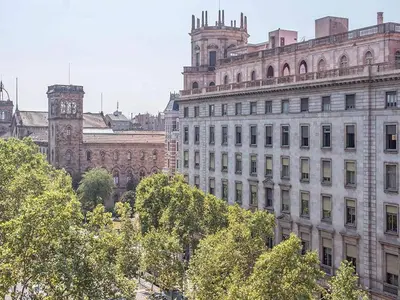 a large building with a clock tower on top of it at Apartment in Barcelona near Seabeach in Barcelona