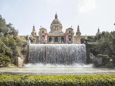 a city with a statue in the middle of a street at Penthouse in Barcelona with Large Terrace in Barcelona
