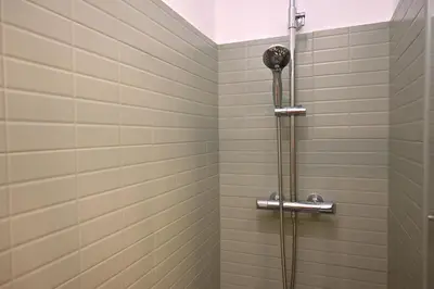 a shower stall in a bathroom with at Homenfun Barcelona Alfonso X in Barcelona