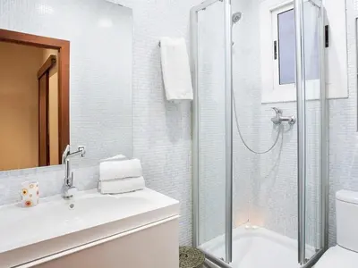 a bathroom with a shower and a sink and a toilet at Apartment in Barcelona near the Beach in Barcelona