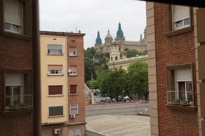 a view of a city from an apartment building at RIUS33 - Huge & Spacious Apartment in Montjuic in Barcelona