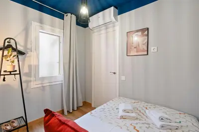 a living room with a couch and chairs at Joan Blanques Apartment in Barcelona