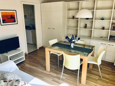 a dining room with a table and chairs at Apartamento con terraza privada y Wifi en el corazón de Barcelona - ES-341-5 in Barcelona