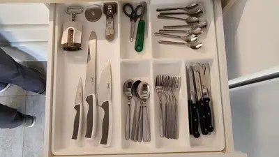 a drawer filled with lots of utensils at ANTIC Manresa 1 in Manresa