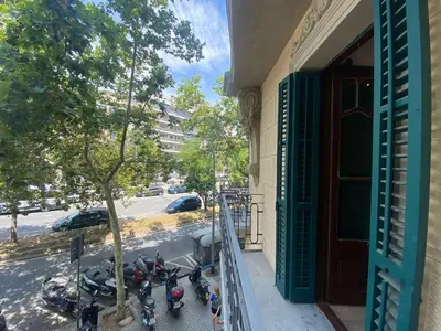a group of motorcycles parked outside of a building at Barcelona Rent - Gaudi House in Barcelona