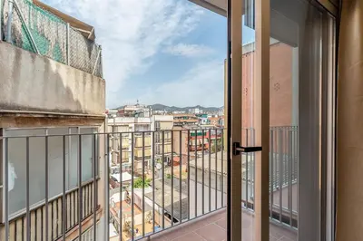 a balcony with a view of a city at 4236 - AB Santa Coloma III in Santa Coloma