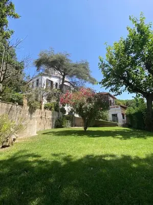 a bedroom with a bed and a window at Mas Llavaneres in Sant Andreu de Llavaneres