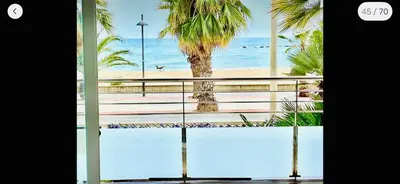 a view of the beach from a window at Frente a mar salida directa playa solo 30M agua in Cubelles
