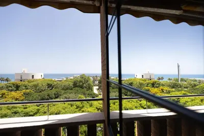 a view of the ocean from a balcony at Lets Holidays Apartment Sea Views in Barcelona in Barcelona