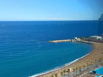 an aerial view of a beach and the ocean at Suitur apartamento exclusivo céntrico Barcelona in Barcelona