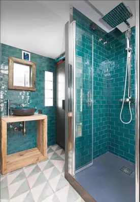 a bathroom with a sink and a shower with blue tiles at Outdoor Bathtub! 360 Rooftop with Chill Out and Amazing Views! in Barcelona