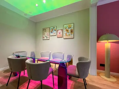 a dining room with a glass table and chairs at Stay U-nique Apartment Castanyer in Barcelona
