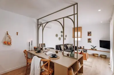 a room with a desk with a large mirror at Olivo - 1 bedroom and terrace in Eixample Esquerra in Barcelona