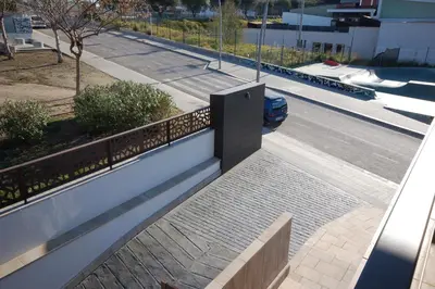 a view of a street with a car on the road at Resort Sitges Apartment in Sitges