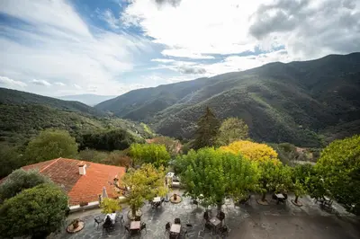 a view of a valley with mountains in the background at Hostal Montserrat in Montseny