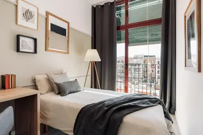a bathroom with a toilet and a glass shower at Canyelles - 2 bedrooms in Sant Antoni in Barcelona