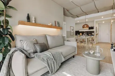 a bedroom with a bed and a large window at Canyelles - 2 bedrooms in Sant Antoni in Barcelona