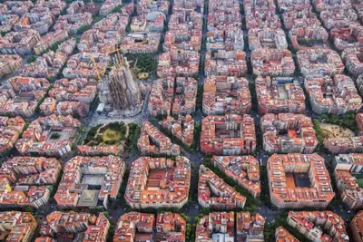 an aerial view of a city with red roofs at Passeig Sant Joan in Barcelona