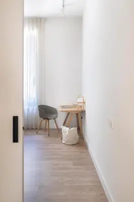 an office with a desk and a chair in a room at Casa Mercader - Simaba Group in Barcelona