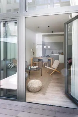 a kitchen and living room with a dining room at Casa Mercader - Simaba Group in Barcelona