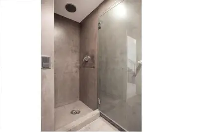 a shower with a glass door in a bathroom at Barceloneta Apartment in Barcelona