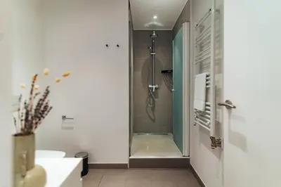 a bathroom with a shower and a sink at Casa Central in Barcelona