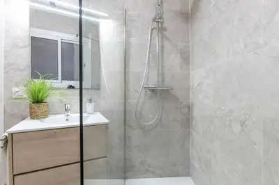 a bathroom with a shower and a sink at Sagrada Familia's View 3B1 5Bath in Barcelona