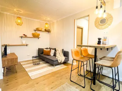 a living room with a couch and a table at Boutique Casanova in Barcelona