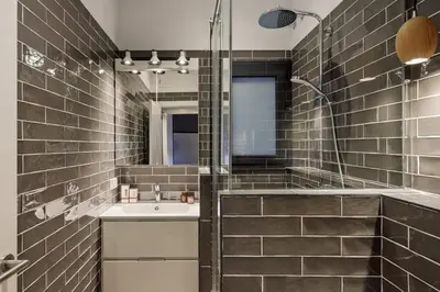 a bathroom with a sink and a mirror at Pau Claris Double - Home next to Paseo de Gracia in Barcelona