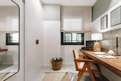 a bathroom with a sink and a mirror at Mojacar - 2 bedrooms in Eixample Esquerra in Barcelona