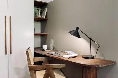 a bedroom with a large bed and a desk at Brisa - 1 bedroom and balcony in Sant Antoni in Barcelona