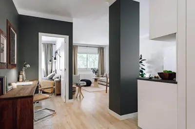 a living room with a couch and a table at Arros - 2 bedroom in El Born in Barcelona