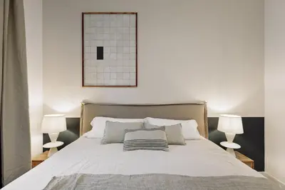 a living room with a couch and a table at Praiano - 2 bedrooms, balcony and terrace in Ciutat Vella in Barcelona