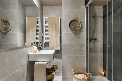 a bedroom with a bed with a basket on it at Encina - 2 bedrooms in Eixample Esquerra in Barcelona
