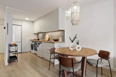 a living room with a couch and a coffee table at Canet - 1 bedroom in Ciutat Vella in Barcelona