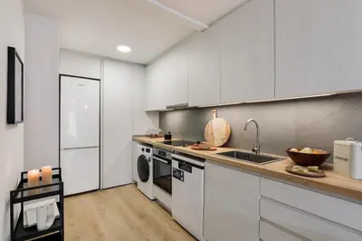 a living room with a couch and a table at Canet - 1 bedroom in Ciutat Vella in Barcelona
