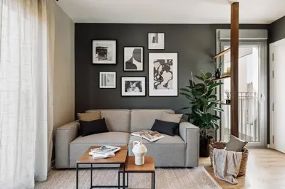 a living room with a couch and a table at Roc - 2 bedrooms in Poblenou in Barcelona